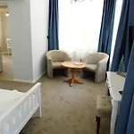 Millennium Gazde/Camere de închiriat *